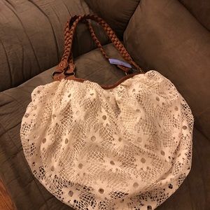 Claire’s cream lace hobo bag